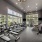 Open and well-lit fitness center at Stono Oaks