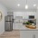 Well-lit modern kitchen with ample counter space at Stono Oaks