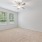 Unfurnished carpeted apartment bedroom at Stono Oaks