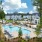 Aerial view of Stono Oaks' community pool and building 
