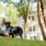 resident with his dog on a leash on lawn