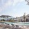 outdoor pool surrounded by umbrella shaded lounge chairs